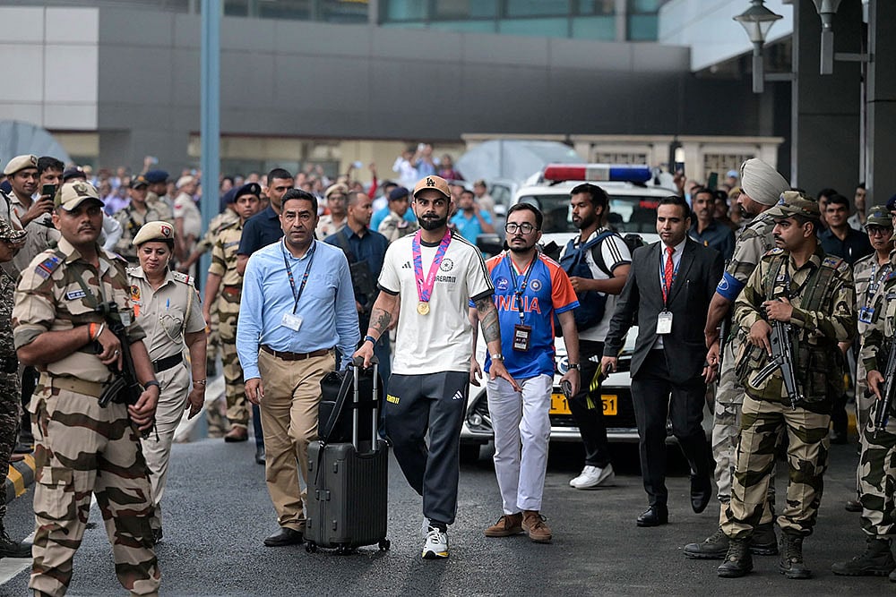 Photo: AP : T20 World Champions Ind team arrives in Delhi