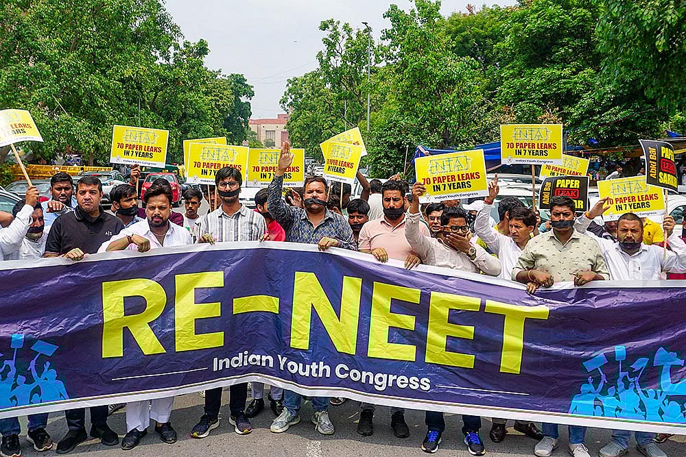 Photo: PTI : RE-NEET protest in Delhi