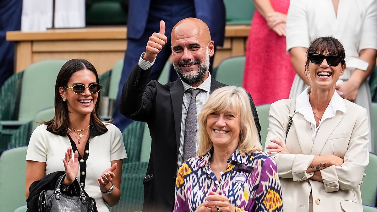 Pep Guardiola gestures towards Alexander Zverev on Saturday at Wimbledon