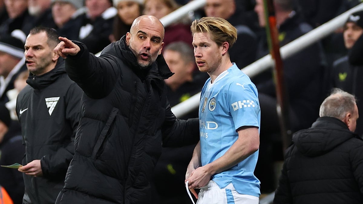 Manchester City manager Pep Guardiola and Kevin De Bruyne - null
