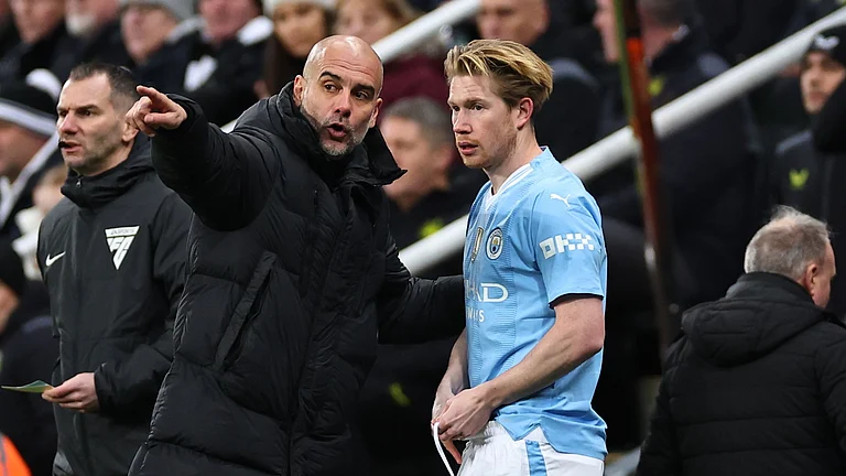 Manchester City manager Pep Guardiola and Kevin De Bruyne - null