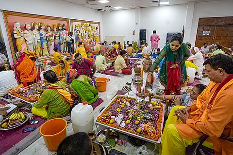 Devotees perform rudra 'Abhishek' ritual