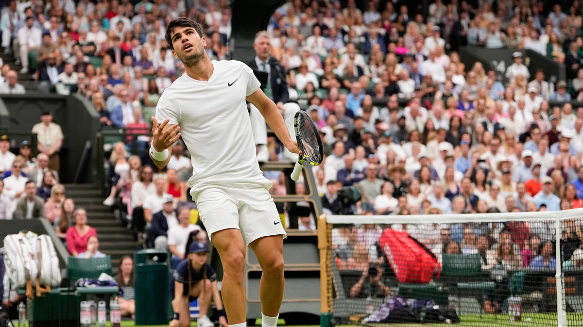 Carlos Alcaraz of Spain reacts during his fourth-round match against Ugo Humbert of France at the Wimbledon tennis championships in London. - AP Photo/Alberto Pezzali