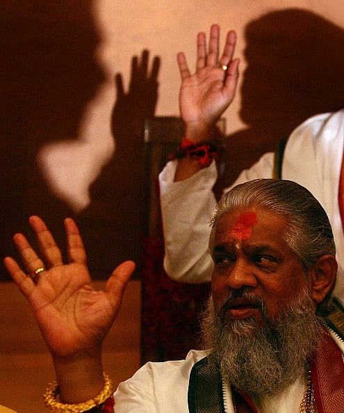 Chandraswami gestures during a press meet in Mumbai on Tuesday. the controversial Godman strongly opposed the Indian Governments decision to establish a trade route between India and Sri Lanka and advocated the preservetion of the Ram Setu which is believed to have been built by Lord Ram. ( - Photo by Ritesh Uttamchandani via Getty Images)