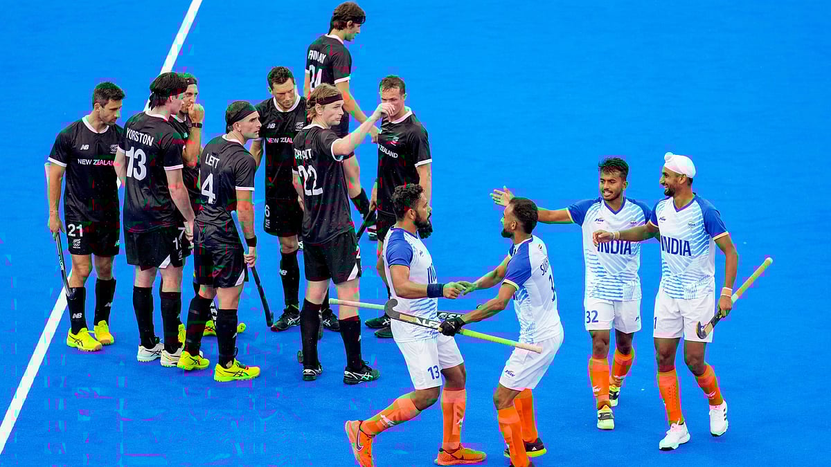 India's Harmanpreet Singh celebrates with teammates after scoring a goal from a penalty stroke against New Zealand during the Pool B hockey match between India and New Zealand, at the Summer Olympics 2024, in Paris. - AP Photo/Aijaz Rahi via PTI