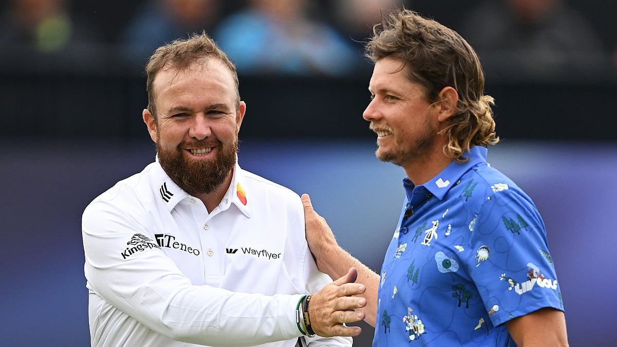 Lowry is congratulated by Cameron Smith