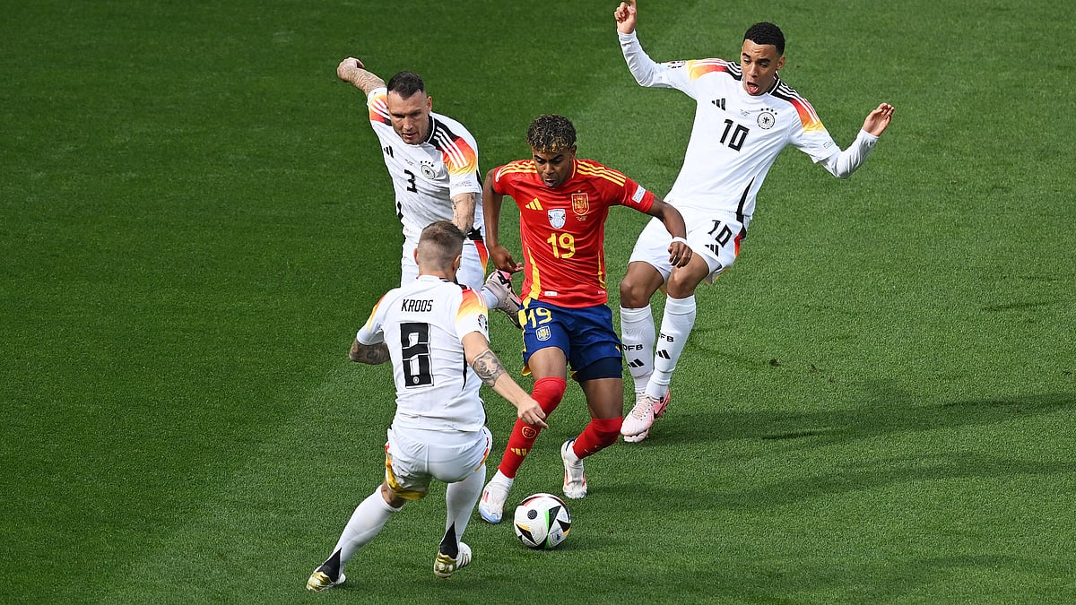 Spain's Lamine Yamal comes under pressure during Friday's quarter-final victory over Euro 2024 hosts Germany