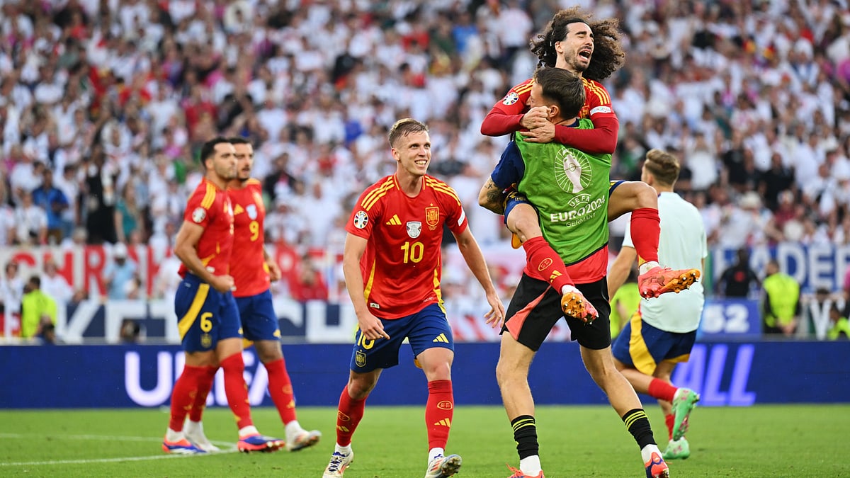 Marc Cucurella celebrates with Spain team-mates after their Euro 2024 quarter-final win against Germany.
