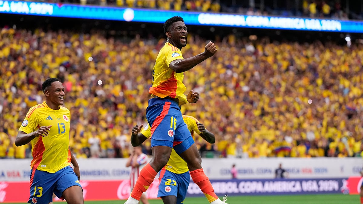 AP Photo/Kevin M. Cox : Colombia's Jefferson Lerma celebrates scoring his side's second goal against Paraguay during a Copa America Group D football match in Houston, Texas.