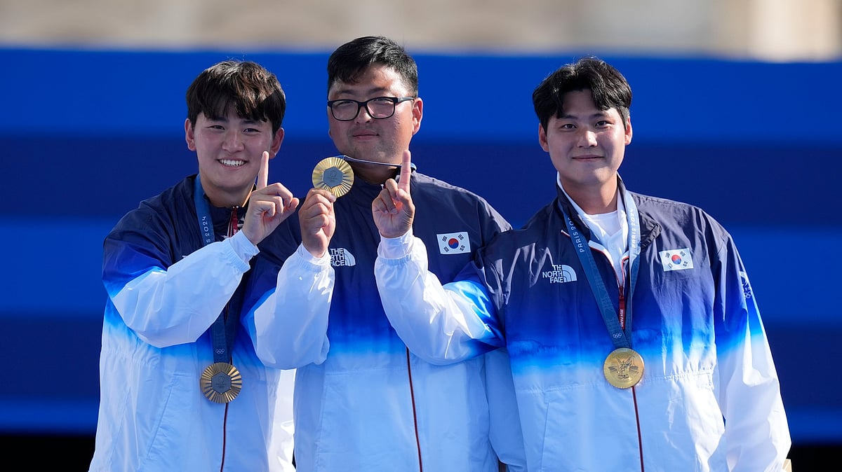 Rebecca Blackwell / AP : South Korea win Men's Archery Team Event