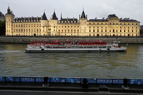Athletes from Canada travel by boat down the Seine River in Paris, France, during the opening ceremony of the 2024 Summer Olympics, Friday, July 26, 2024.