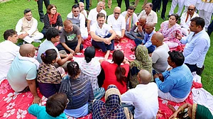 AICC : Leader of the Opposition Rahul Gandhi with the families of Hathras stampede victims |