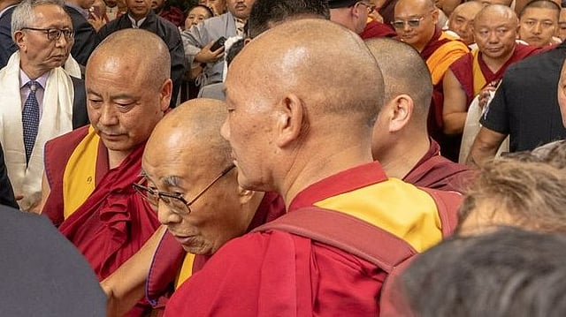 Dalai Lama's Followers Gather Outside NYC Hotel On The Fourth Of July To Pray For His Recovery