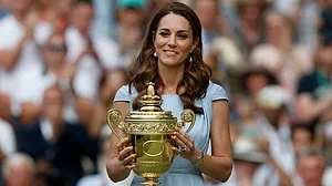 AP : Princess of Wales Kate Middleton holding the Wimbledon trophy |