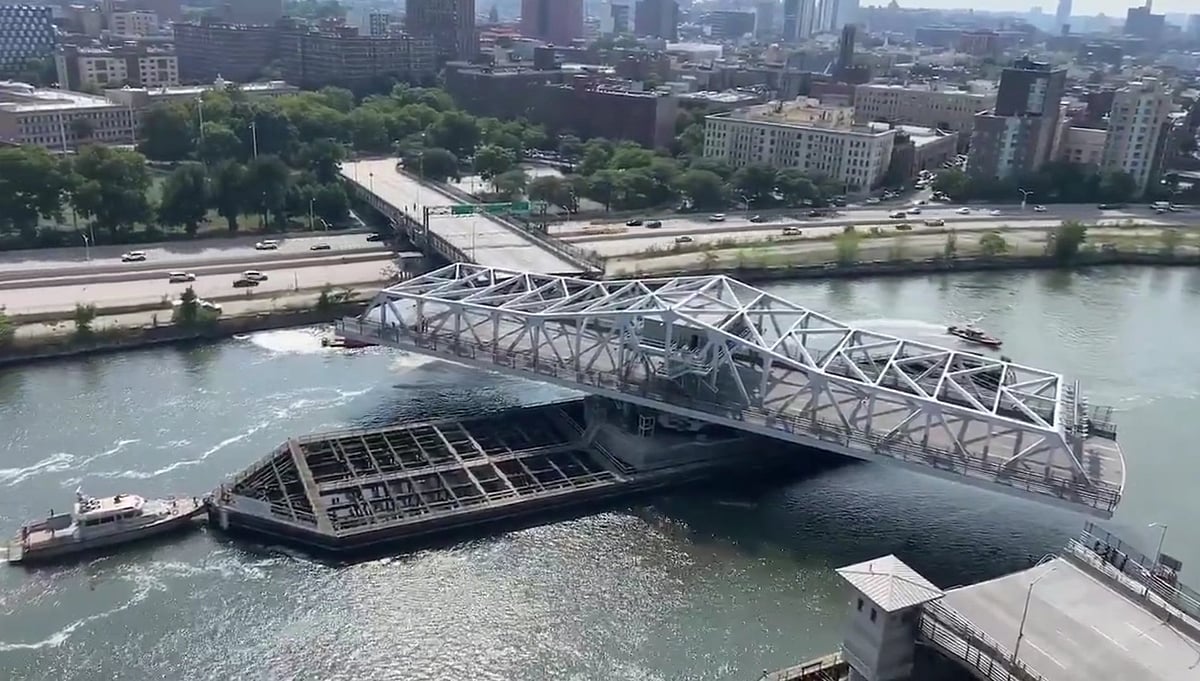 All lanes were temporarily closed, but the bridge reopened by 6:30 pm, with no injuries reported.  - null