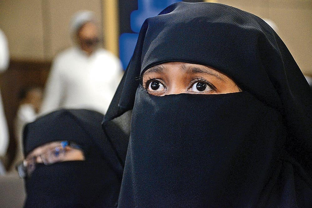 Photo: Getty Images : Personal vs Secular: Muslim woman attends a programme after SC’s Triple Talaq verdict
