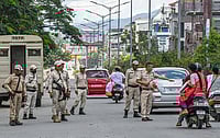  (Photo by Biplov Bhuyan/SOPA Images/LightRocket) : Manipur police officers check commuters during a curfew. Tensions are running high since ethnic clashes erupted last May following a rally organised by the All Tribal Students Union (ATSU) to protest and demand the inclusion of the Meiteis in the Scheduled Tribes (STs) list.