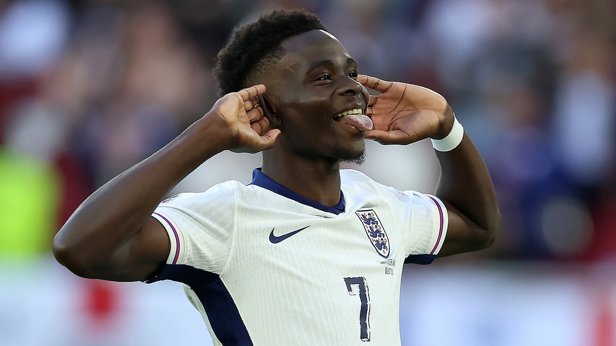 Bukayo Saka celebrates after scoring England's third penalty in the shoot-out