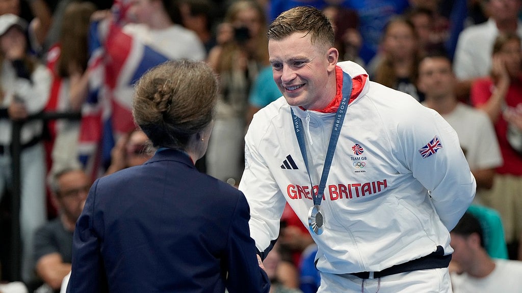 Britain's Princess Anne, left, congratulates Adam Peaty, of Britain, after winning the silver medal in the men's 100-meter breaststroke final at the 2024 Summer Olympics, Sunday, July 28, 2024, in Nanterre, France. - AP/Matthias Schrader