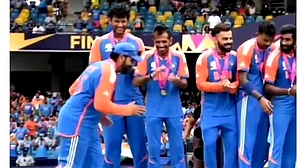 X : Rohit Sharma does the strut.