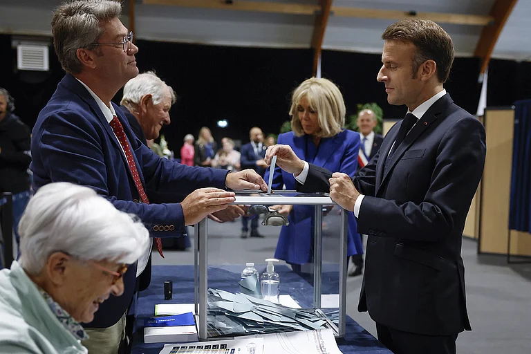 French President Macron votes in second round of parliamentary elections - Mohammed Badra/AP