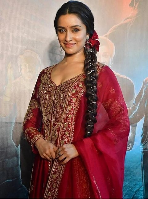 Shraddha in a red anarkali suit
