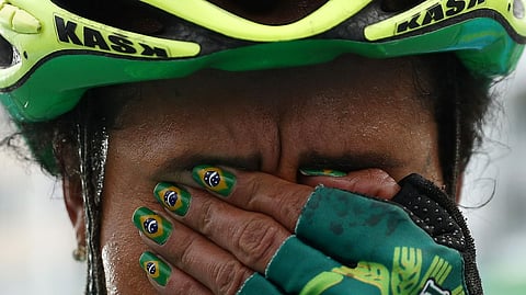 Clemilda Fernandes Silva got her country Brazil's flag done as her nail art.