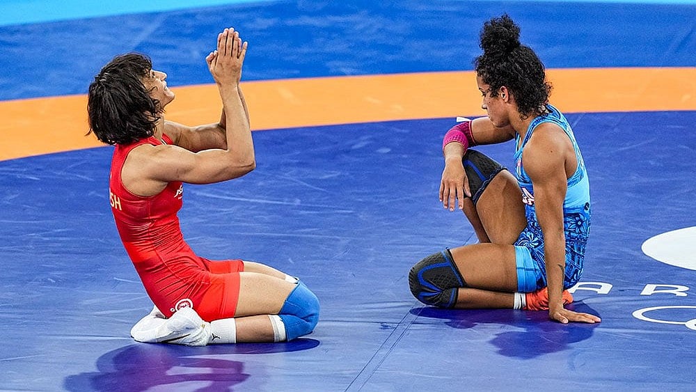 Photo: PTI/Ravi Choudhary : India's Vinesh Phogat celebrates after sealing a spot in the final.