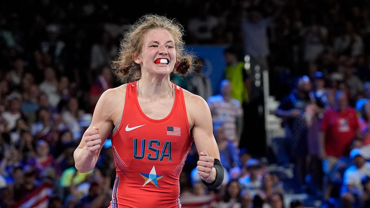 Eugene Hoshiko/AP : Sarah Hildebrandt celebrates her Paris 2024 final qualification