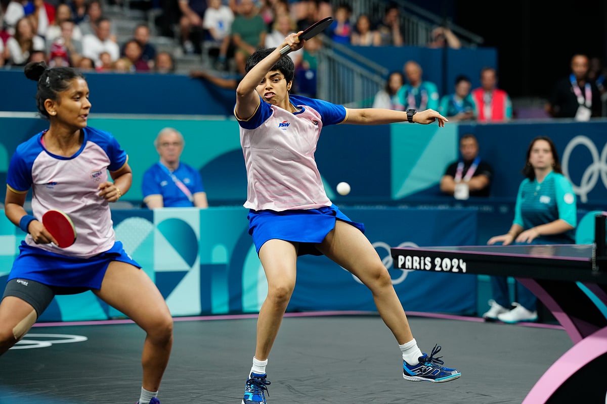  (AP Photo/Petros Giannakouris)
 : India's Archana Girish Kamath, right, and Sreeja Akula play against Romania's Adina Diaconu and Elizabeta Samara during a women's teams round of 16 table tennis match at the 2024 Summer Olympics, Monday, Aug. 5, 2024, in Paris, France.

