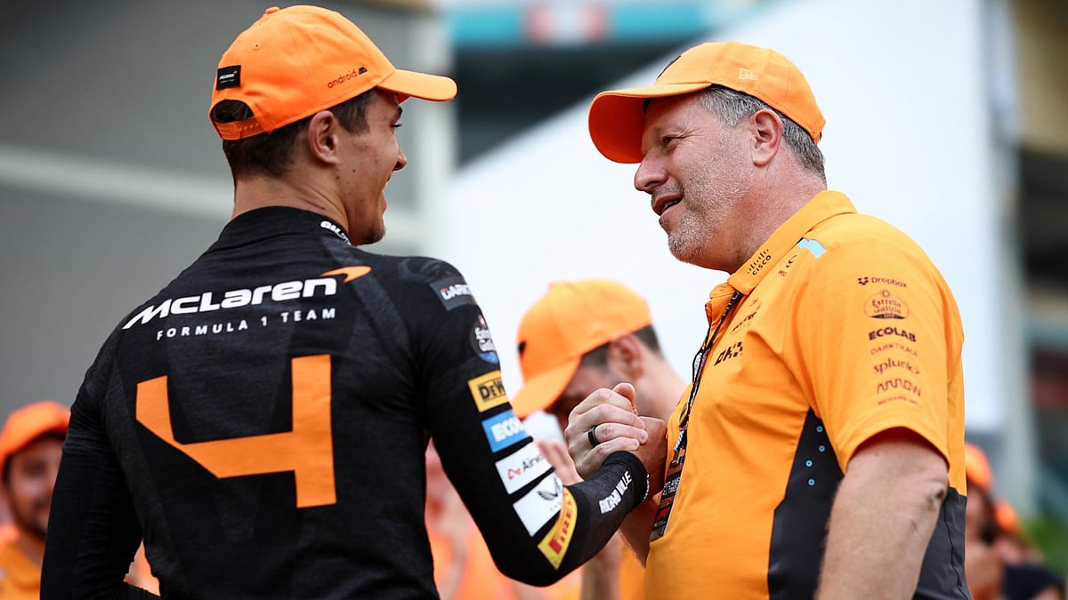 Zak Brown celebrates win with Lando Norris in Miami.