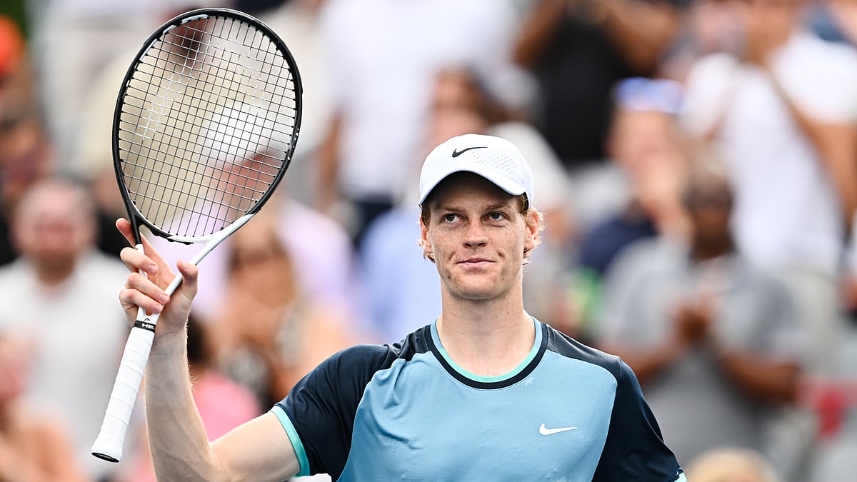 Jannik Sinner celebrates after winning match point on Thursday - null