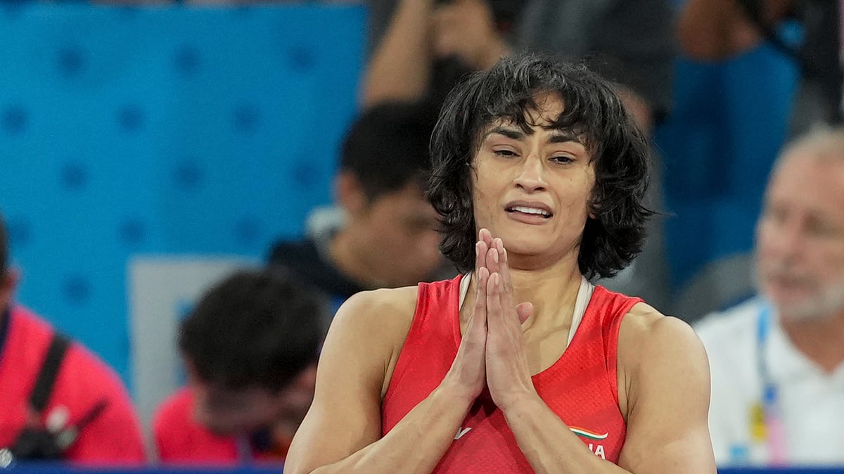 PTI Photo/Ravi Choudhary : Wrestler Vinesh Phogat celebrates after winning her Women's Freestyle 50kg semi-final wrestling match against Cuba's Yusneylys Guzman Lopez at the 2024 Summer Olympics.