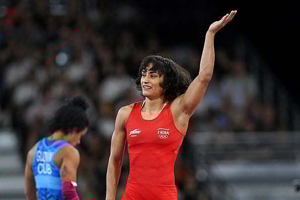  (Photo by David Ramos/Getty Images) : Vinesh Phogat celebrates victory against Cuba's Yusneylis Guzman Lopez during the semifinal at the Olympic Games on August 6 in Paris.