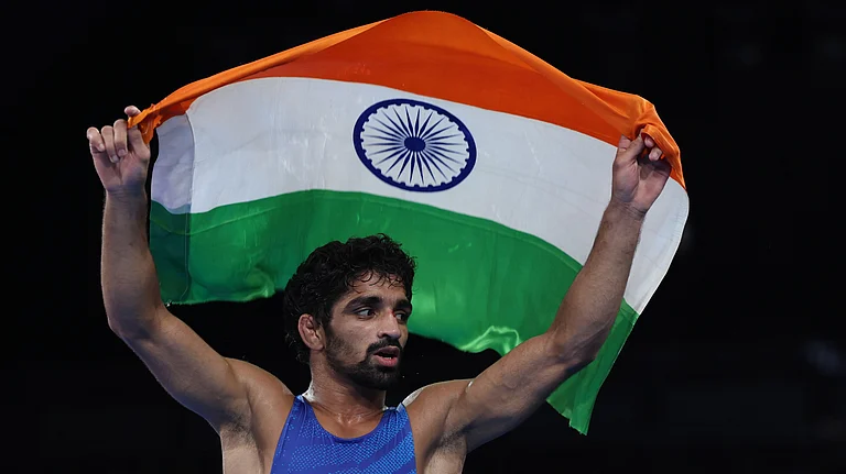 India's Aman Sehrawat celebrates after clinching the men's freestyle wrestling 57kg bronze medal at the Paris Olympics. - PTI