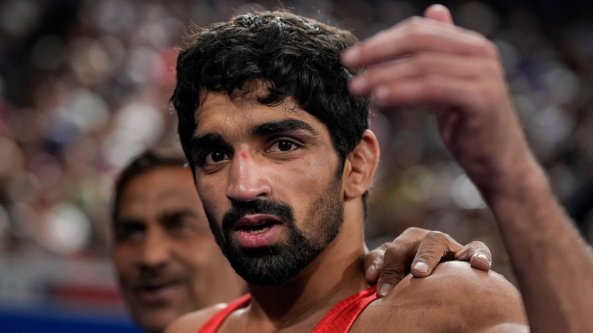 PTI : Aman Sehrawat after winning his bronze medal bout at the Paris Olympics.
