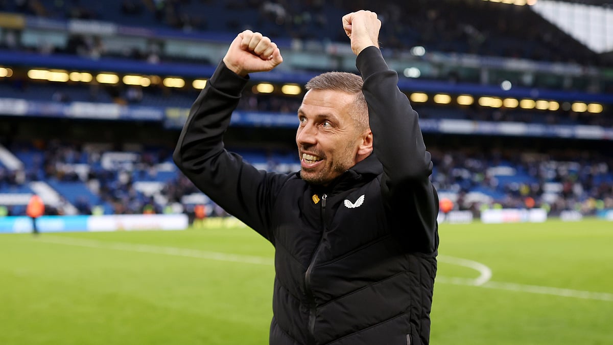 Wolves boss Gary O'Neil celebrates a victory over Chelsea in February