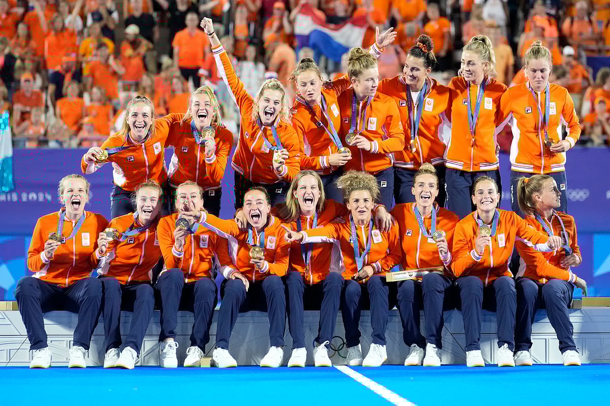 Team Netherlands poses for a photograph after winning the gold medal in the women's field hockey at the Yves-du-Manoir Stadium during the 2024 Summer Olympics, Friday, Aug. 9, 2024, in Colombes, France. -  (AP Photo/ Anjum Naveed)


