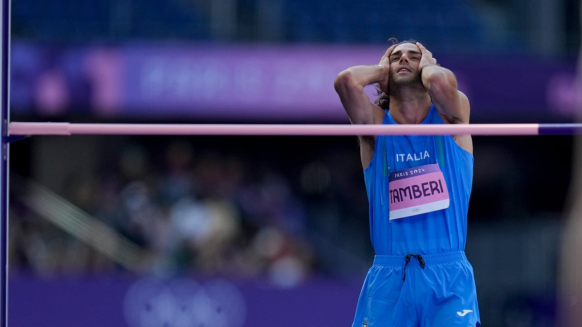 AP Photo/Natacha Pisarenko : Gianmarco Tamberi, of Italy, reacts during the men's high jump qualification at the 2024 Summer Olympics.