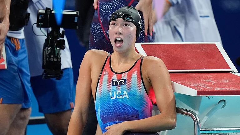 United States' Torri Huske celebrates winning the last lap in the mixed 4x100-meter medley relay final at the Summer Olympics in Nanterre, France. - AP Photo/Brynn Anderson