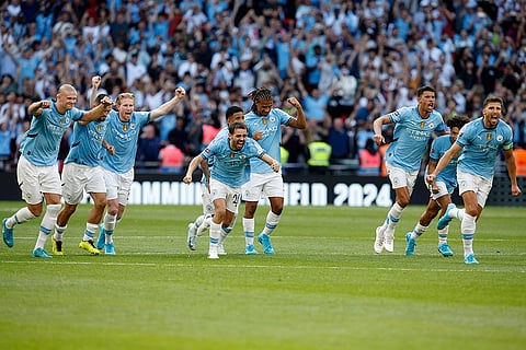 Manchester City players celebrate