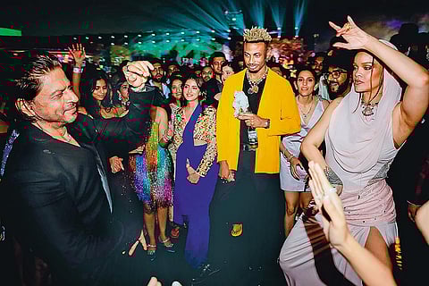 Shah Rukh Khan dances with pop-icon Rihanna at the bash