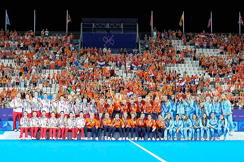 Womens field hockey medal ceremony: Chinas silver-medallists, Netherlands gold-medallists and Argentinas bronze-medallists