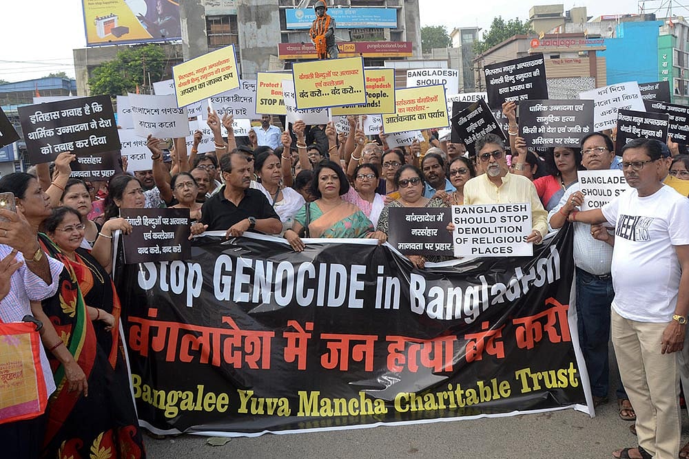 Photo: PTI : Protest over violence against Hindus in Bangladesh