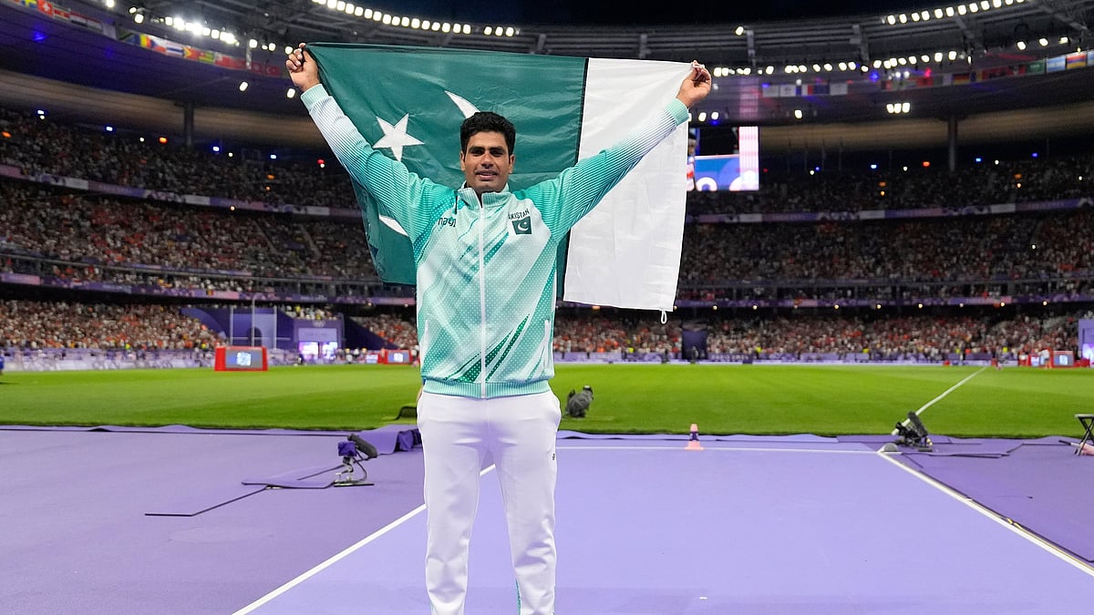 Arshad Nadeem, of Pakistan, celebrates after winning the men's javelin throw final at the 2024 Summer Olympics, Thursday, Aug. 8, 2024, in Saint-Denis, France.  - (AP Photo/Matthias Schrader)


