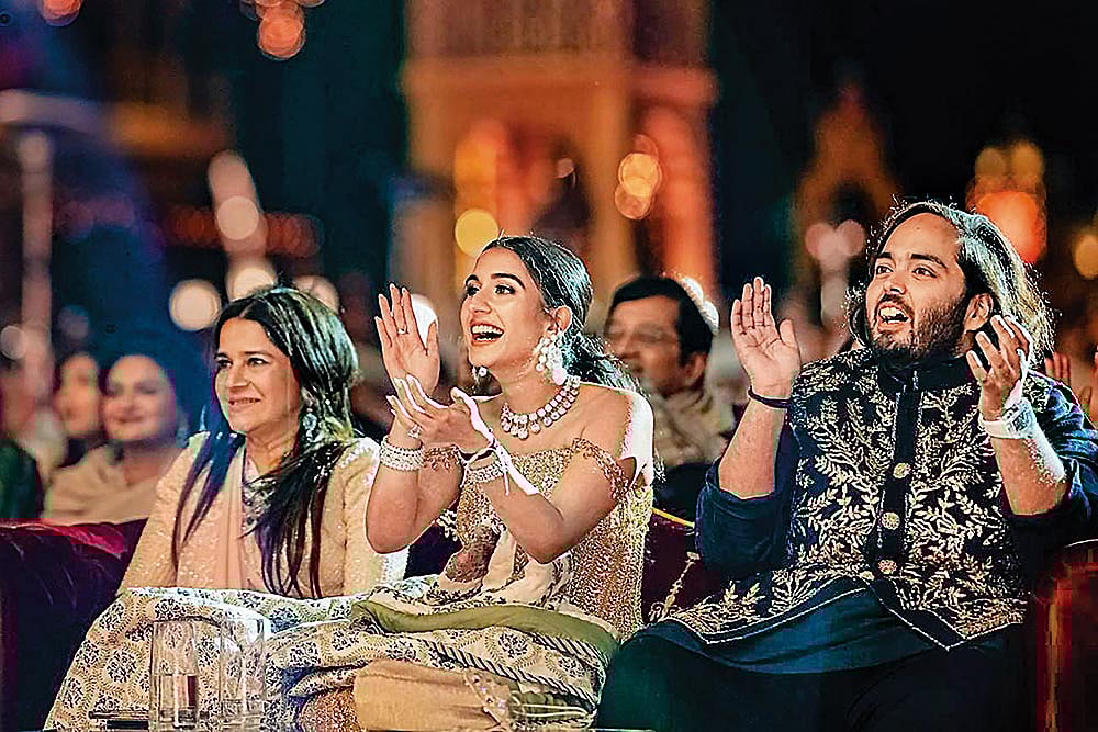 Photo: PTI : Such a Long Celebration: Anant and Radhika at their pre-wedding bash in Jamnagar