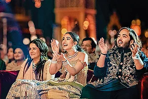 Photo: PTI : Such a Long Celebration: Anant and Radhika at their pre-wedding bash in Jamnagar