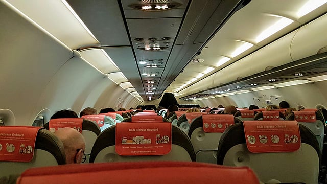 Why Are People Bragging About Their 'Boring' Flights? Raw-Dogging Trend Explained