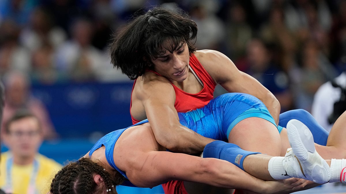 Eugene Hoshiko/AP : Vinesh Phogat.