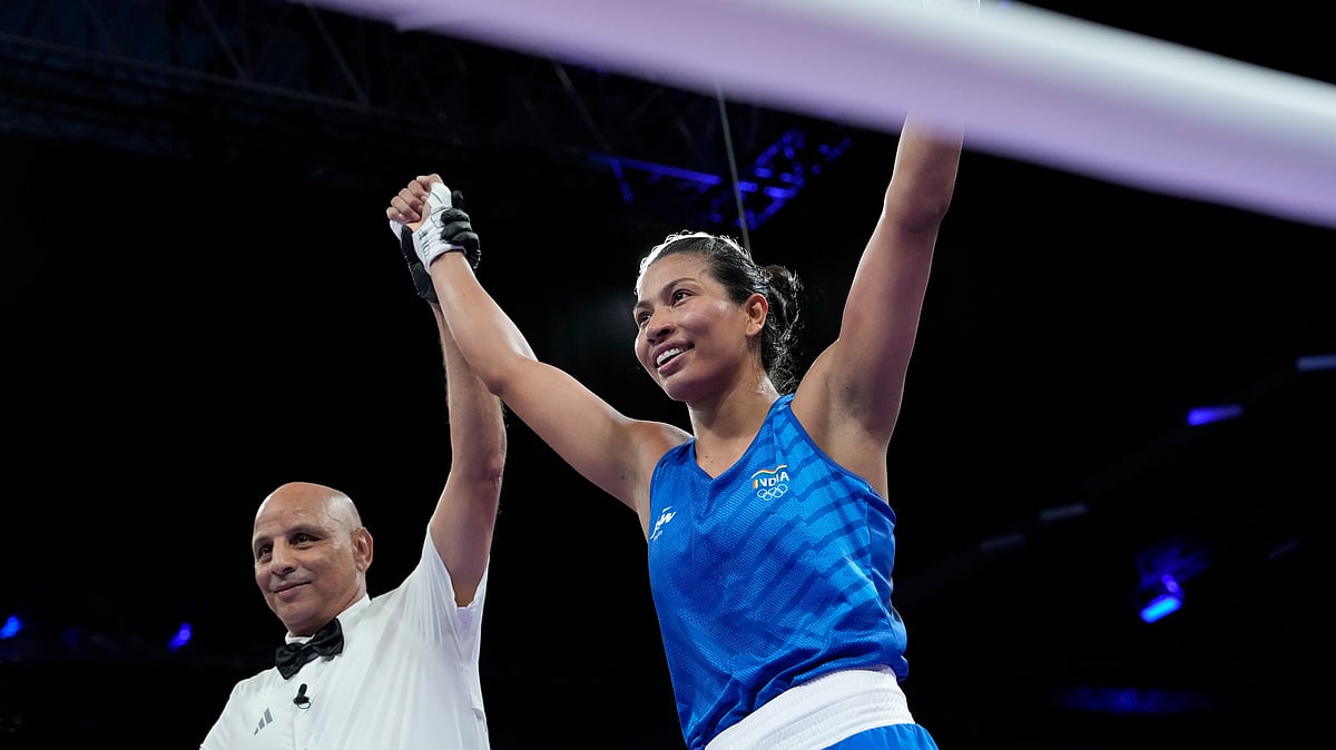 AP Photo/Ariana Cubillos : India's Lovlina Borgohain celebrates after defeating Norway's Sunniva Hofstad in their women's 75 kg preliminary boxing match at the 2024 Summer Olympics.